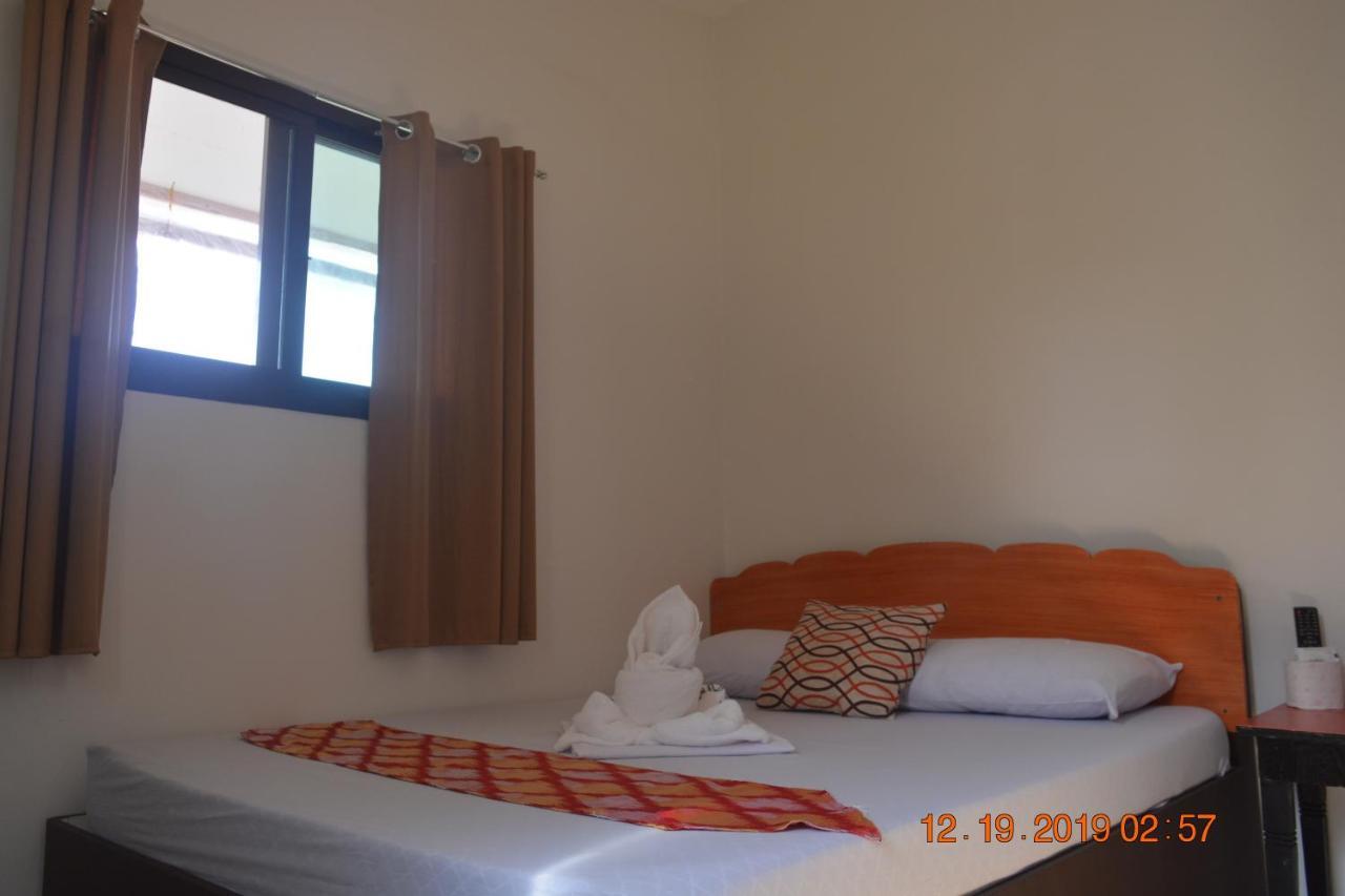 Oyo 712 Island Hop Nido Hostel El Nido Bagian luar foto